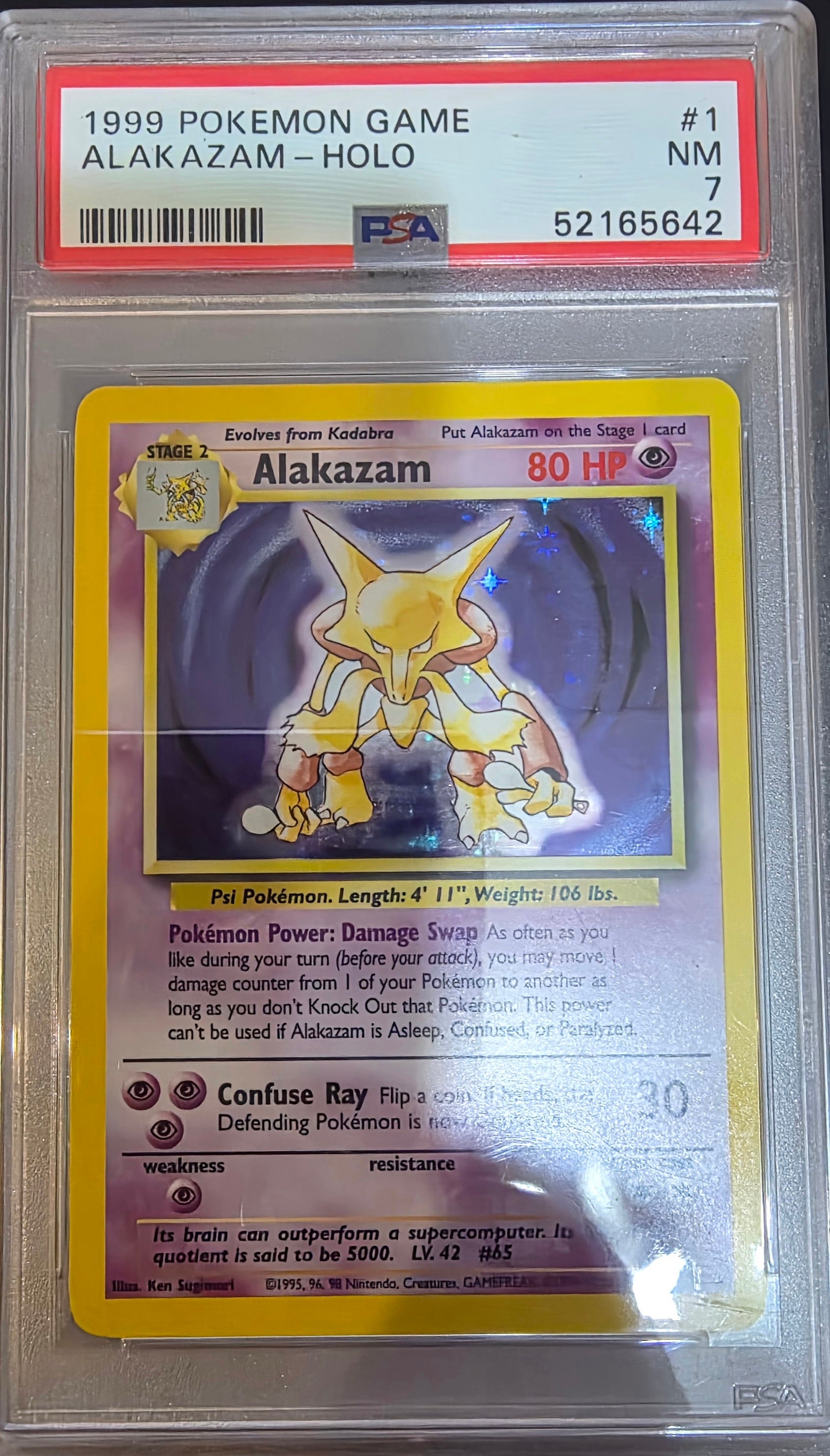 PSA 7 1999 Pokémon Base Set Unlimited #1 Alakazam-HOLO